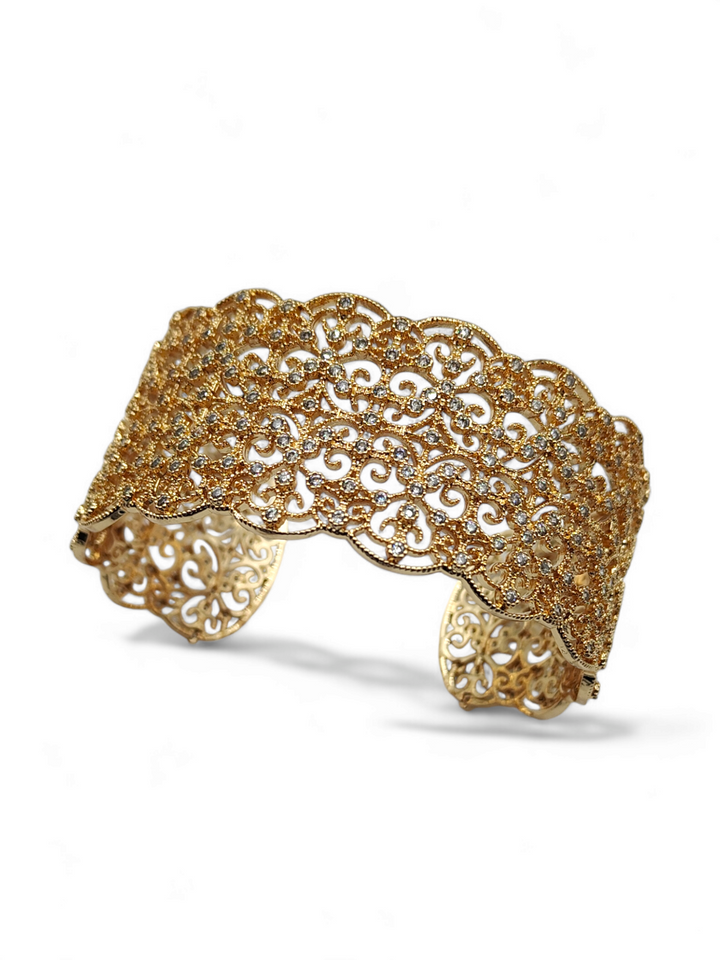 Precious filigree embroidered bracelet mounted on bronze
