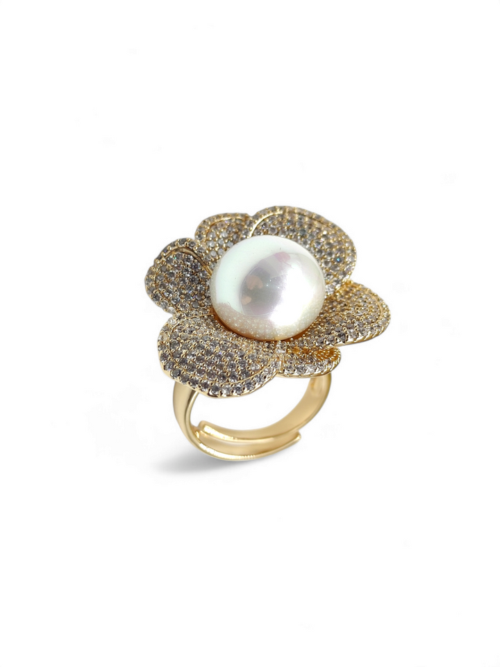 Precious flower ring in pearl and zirconia mounted on bronze