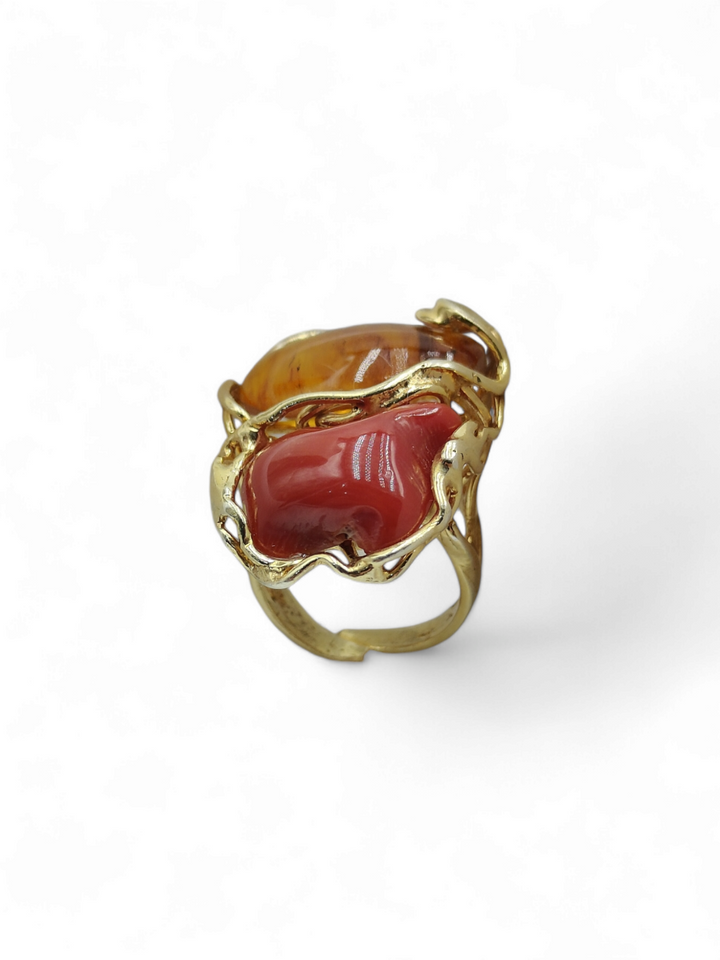 Anello corallo e ambra montato su argento