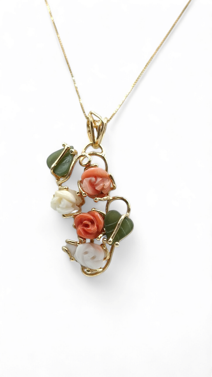 Collana ciondolo fiori  in corallo vero montato su argento
