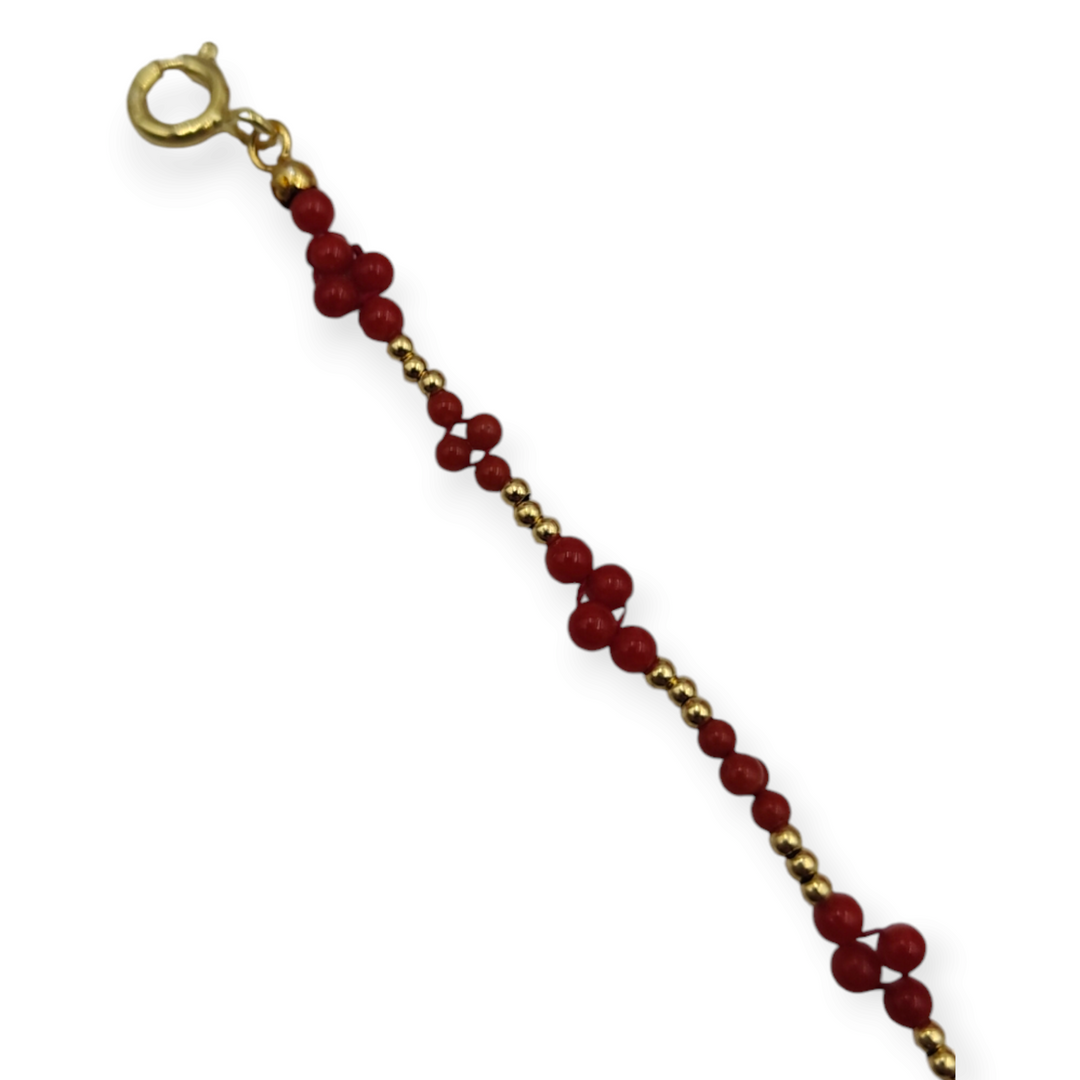 Real coral bracelet in fabric mounted on 18 kt gold