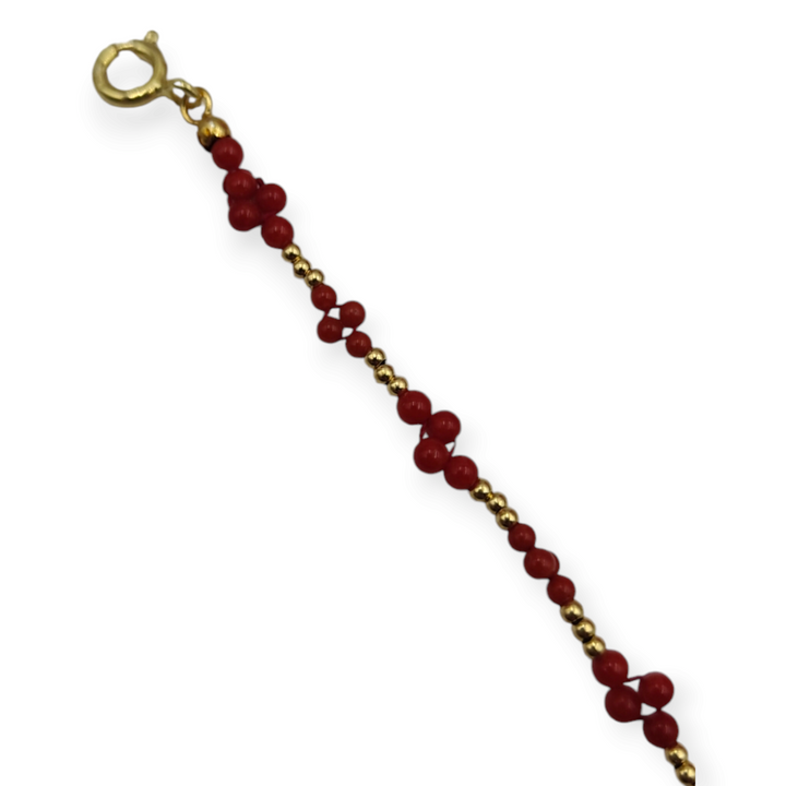 Real coral bracelet in fabric mounted on 18 kt gold