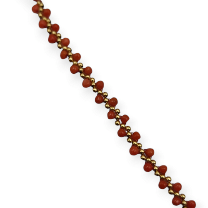 Real coral bracelet in fabric mounted on 18 kt gold