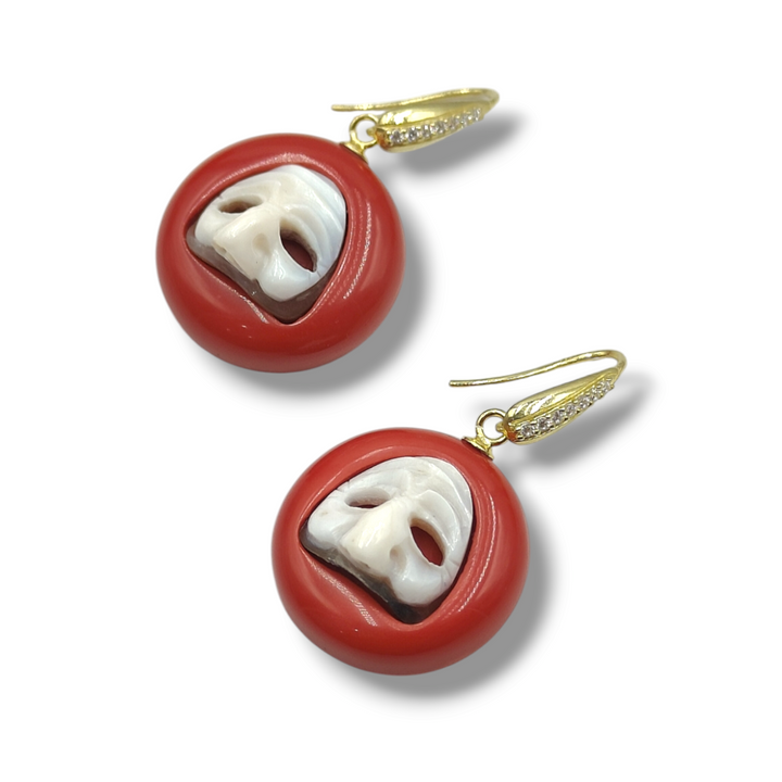 Neapolitan mask earrings in sardonic cameo mounted on red agate