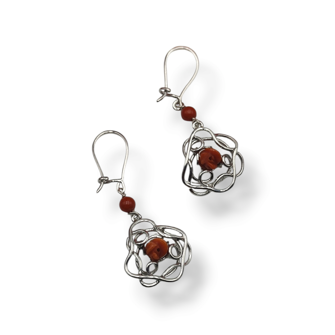 Pink coral flower earrings mounted on silver