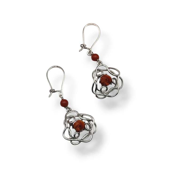 Pink coral flower earrings mounted on silver