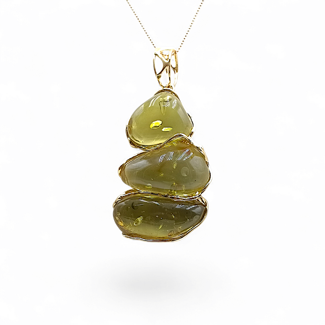 Pendant necklace "tris of green amber" mounted on silver