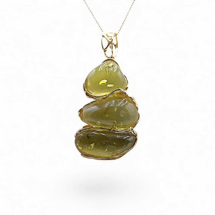 Pendant necklace "tris of green amber" mounted on silver
