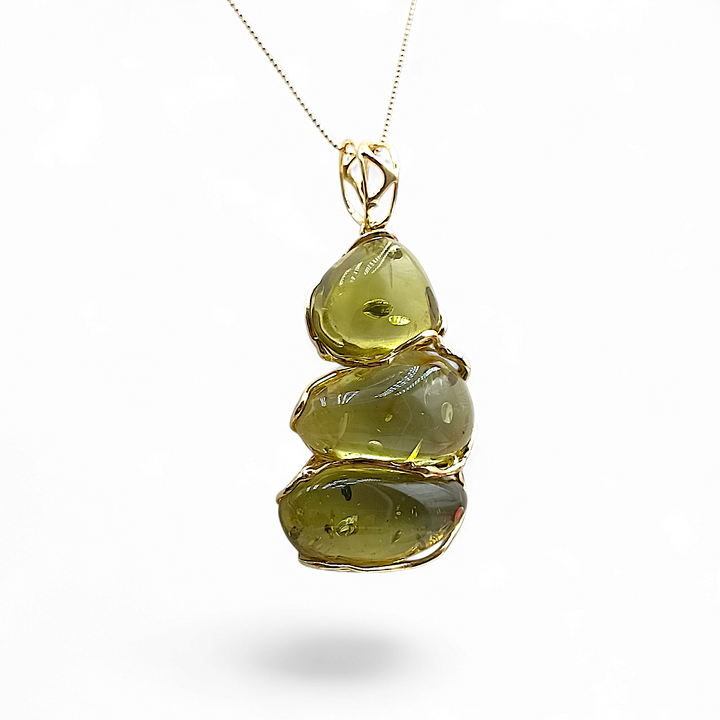 Pendant necklace "tris of green amber" mounted on silver