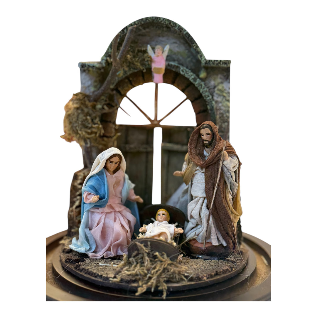 Nativity scene in a bell with terracotta characters and real clothes