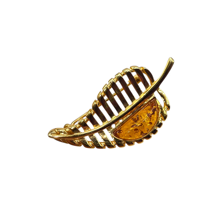 Amber leaf brooch mounted in silver