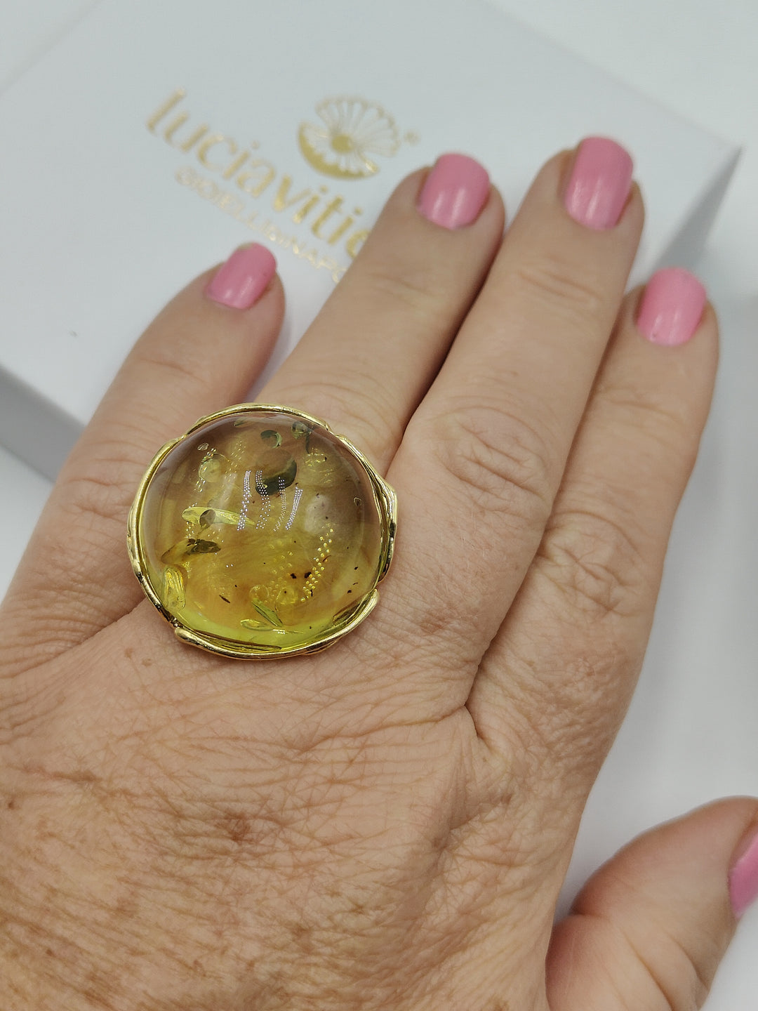 Green amber ring mounted on silver