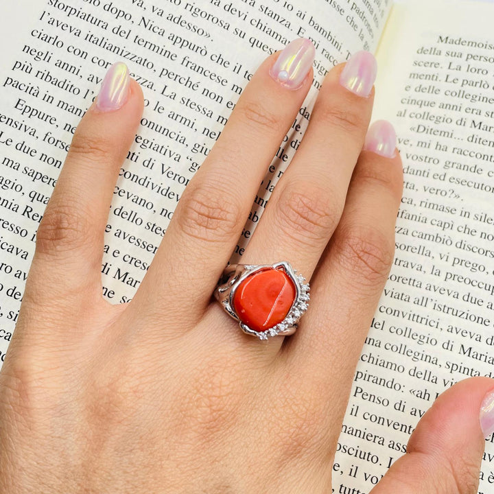 Red coral stone ring mounted on silver