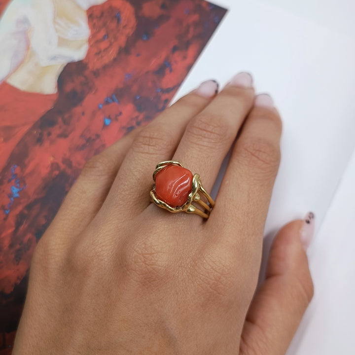 Coral stone ring mounted on silver