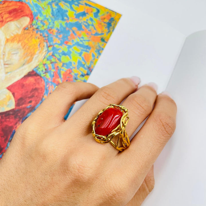 Red coral stone ring mounted on silver