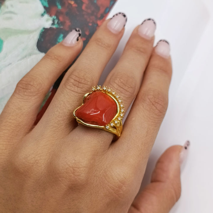 Coral stone ring mounted on silver