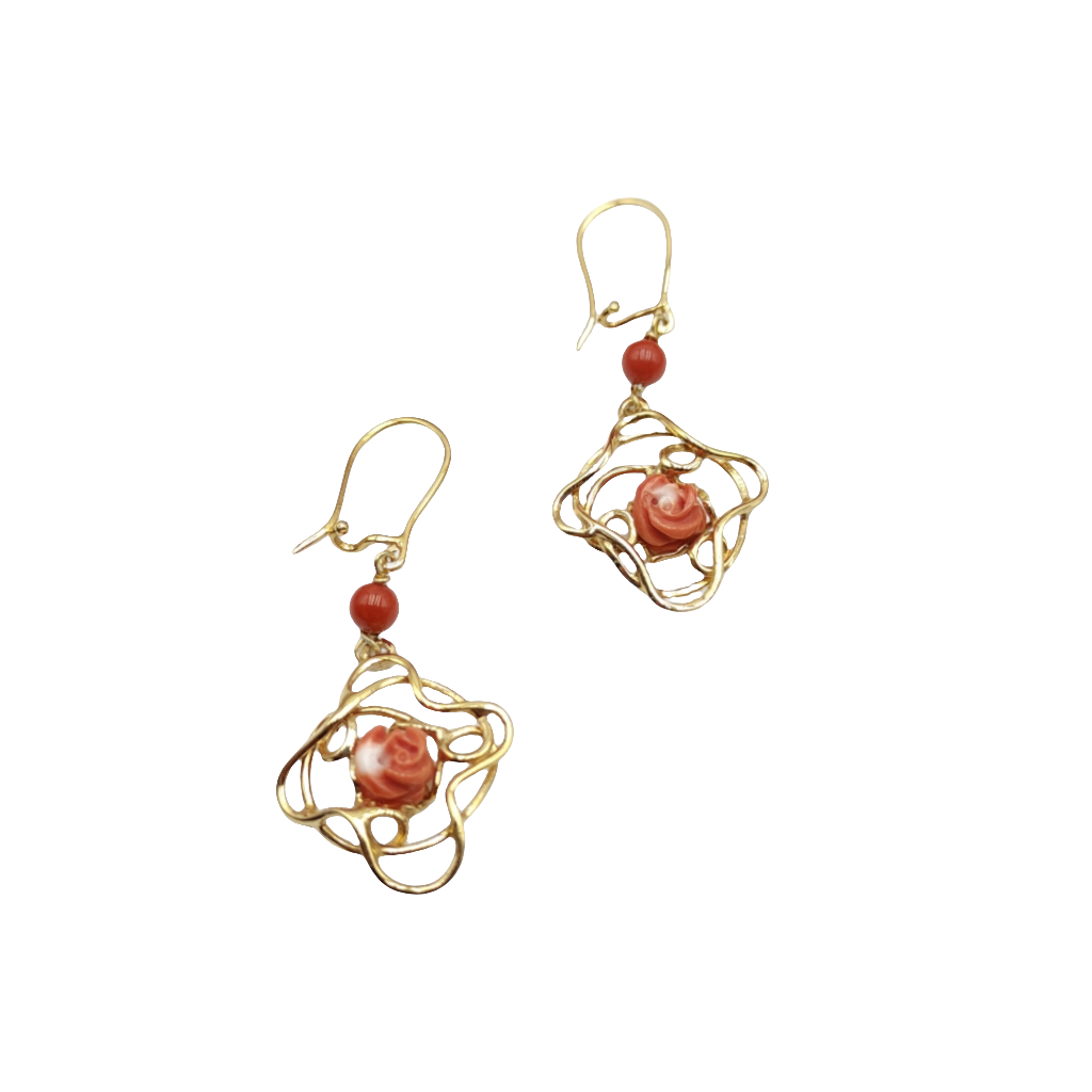 Pink coral flower earrings mounted on silver
