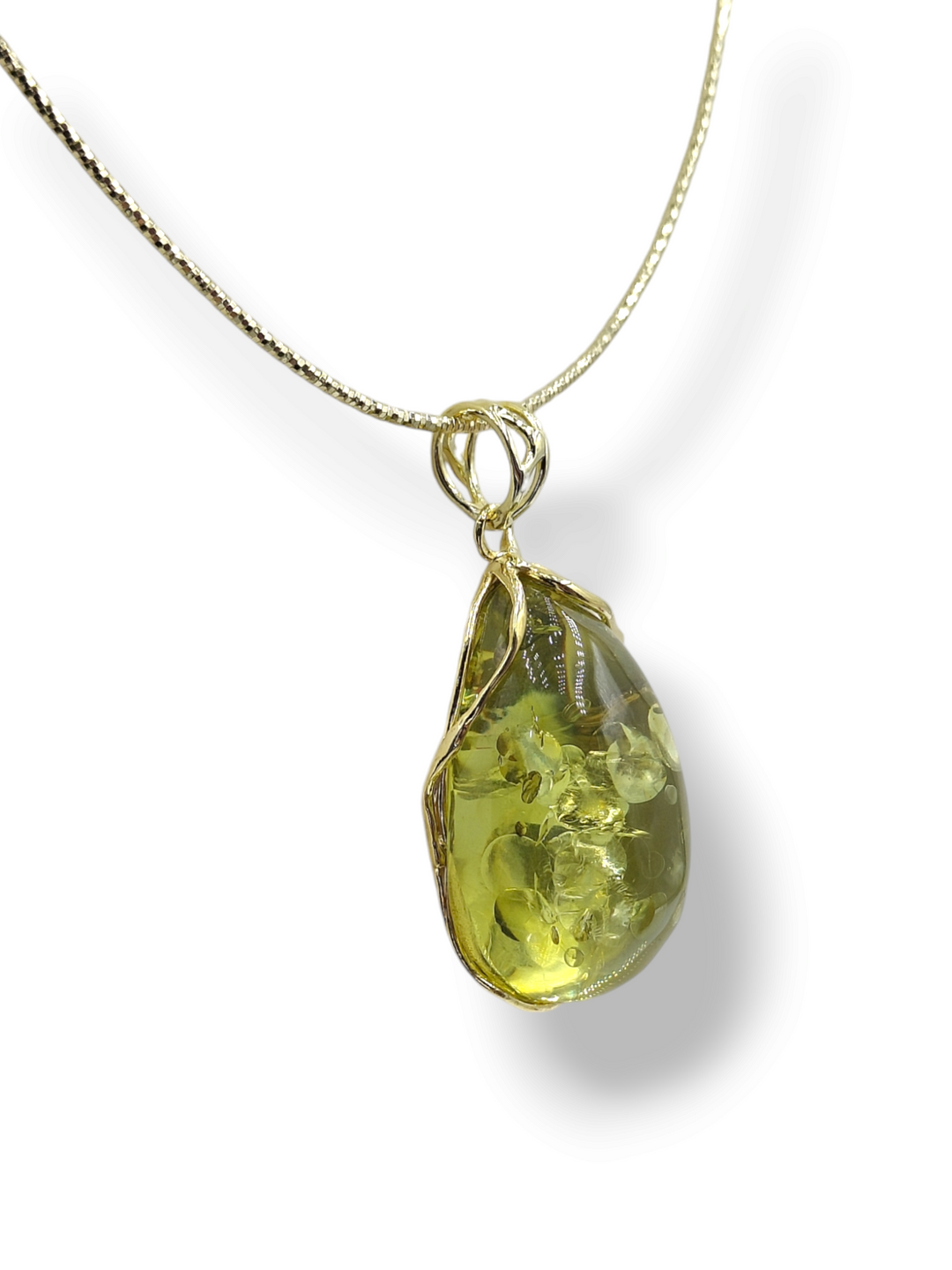 Green amber pendant mounted on silver