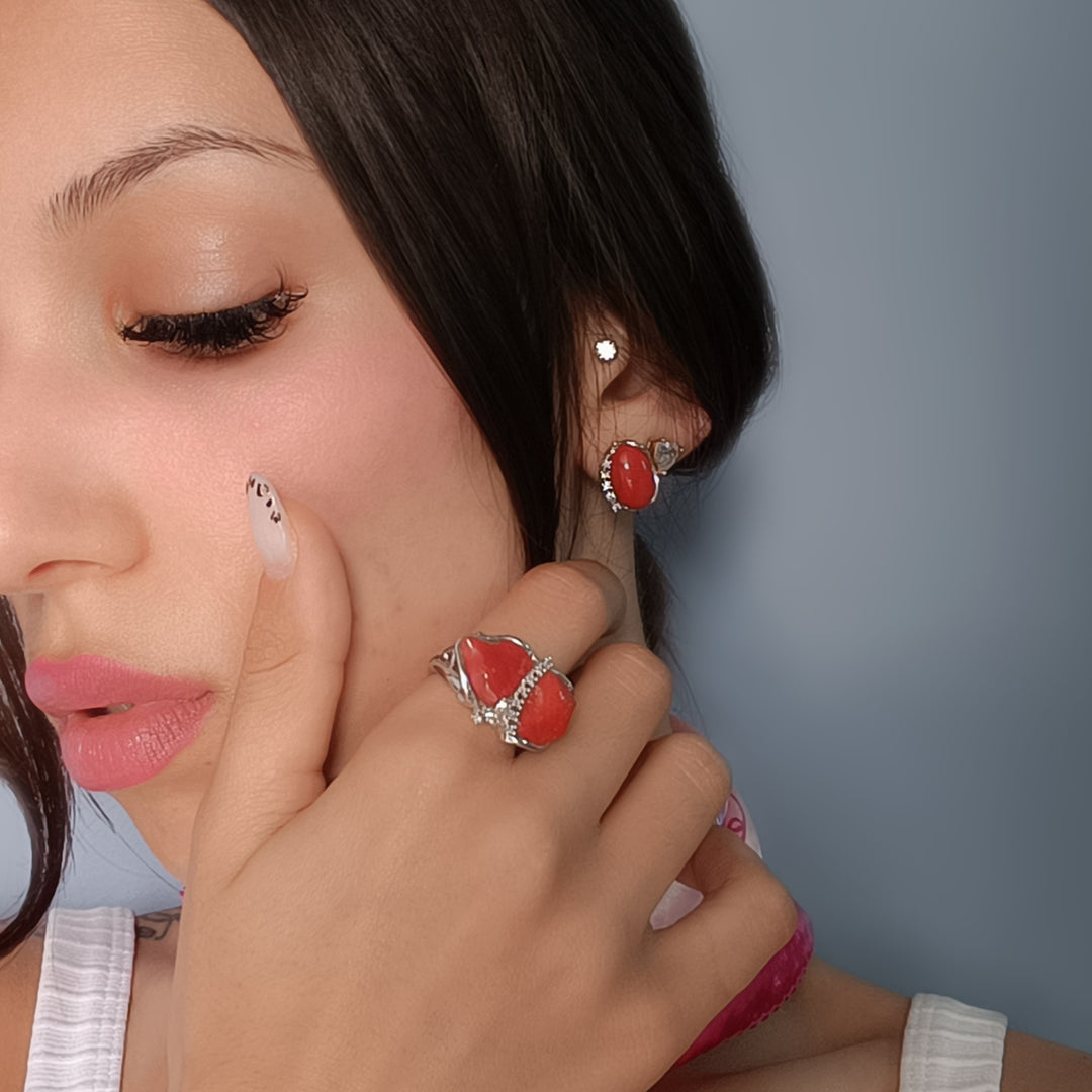 Coral stone earrings set in silver
