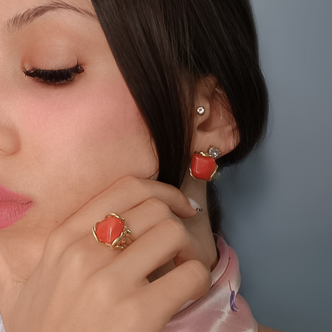 Coral stone ring mounted on silver