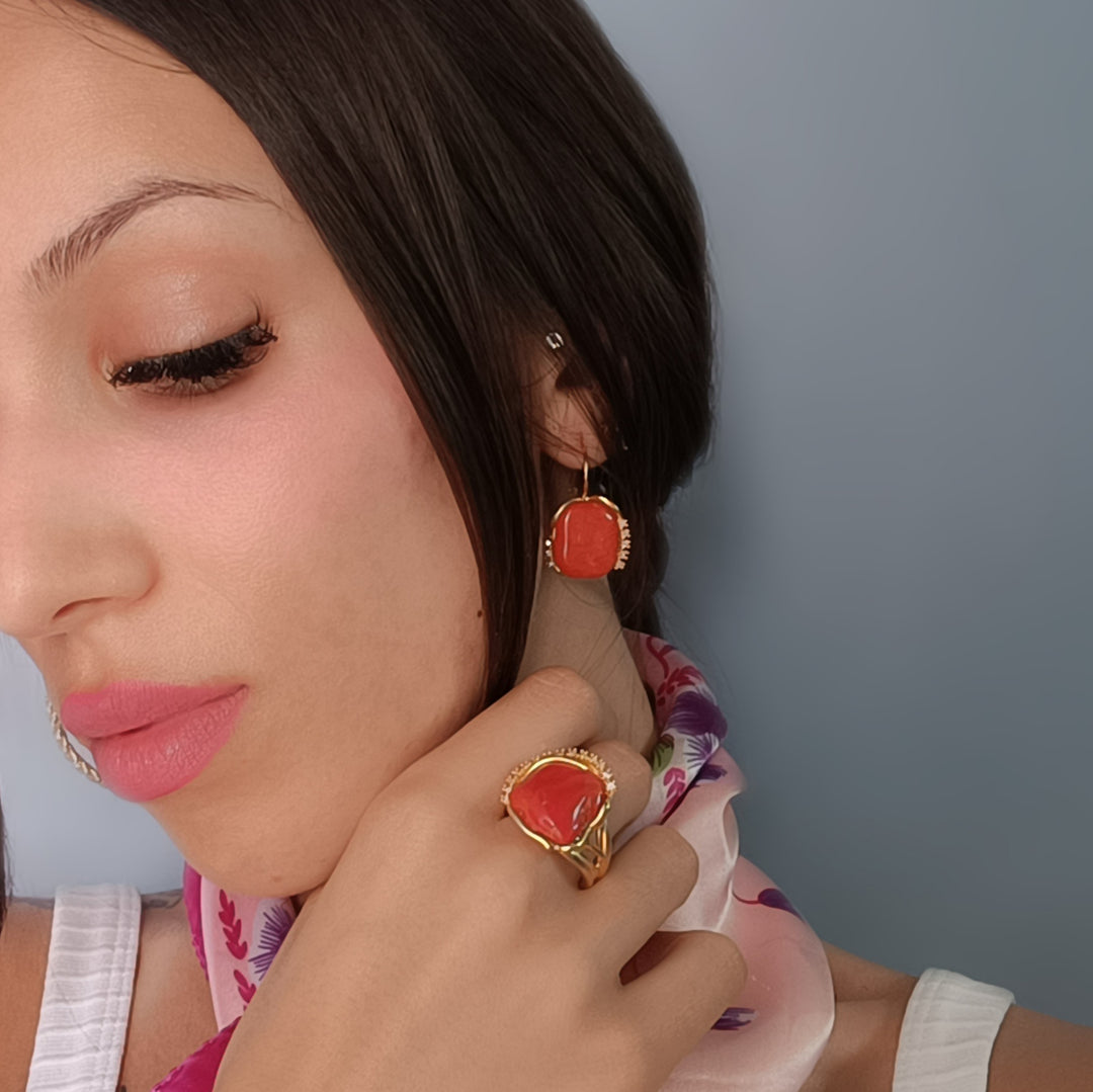 Coral stone ring mounted on silver