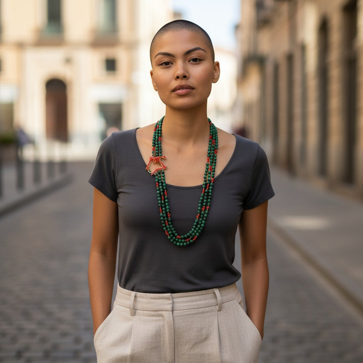 Multi-strand necklace of malachite and coral set in silver