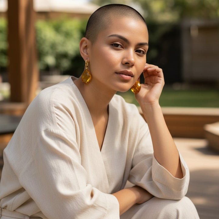 Orecchini Goccia in Ambra Marrone del Mar Baltico montati in Argento Dorato