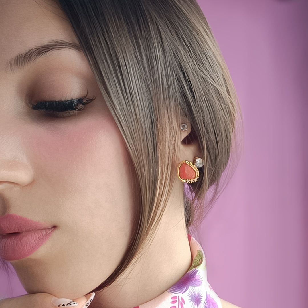 Coral stone earrings set in silver