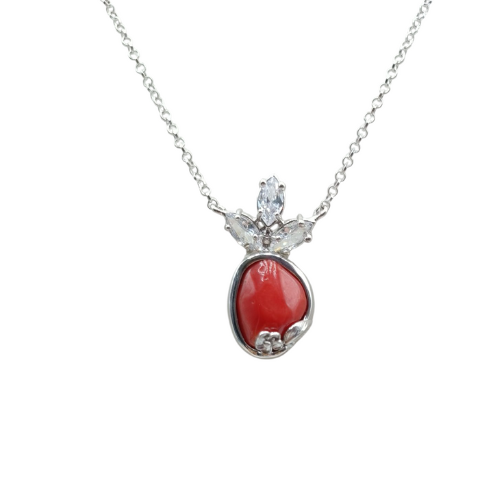 Necklace with red and pink coral pendant mounted on silver and gold-plated silver