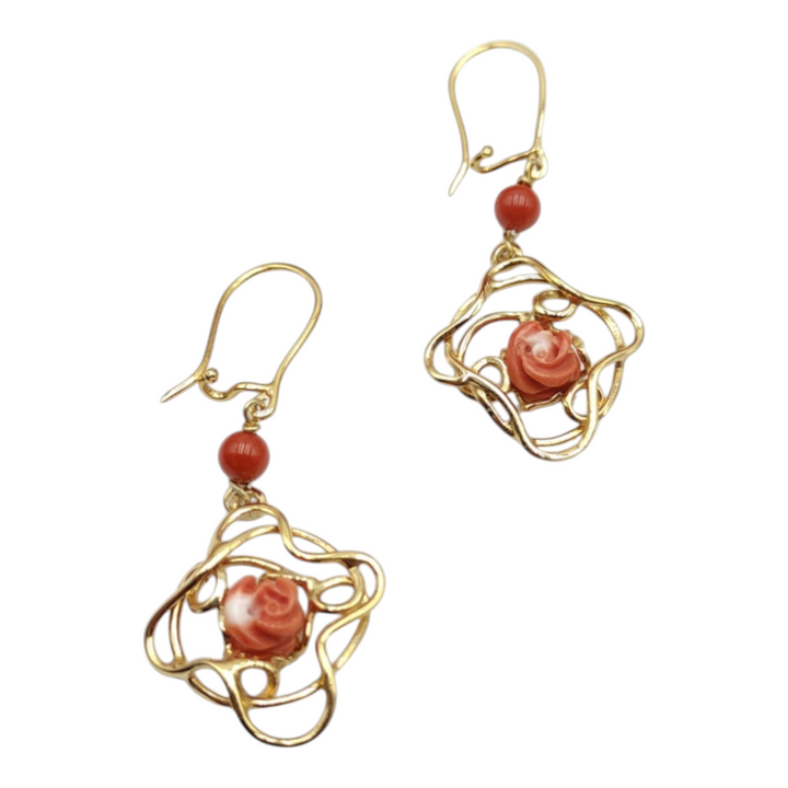 Pink coral flower earrings mounted on silver