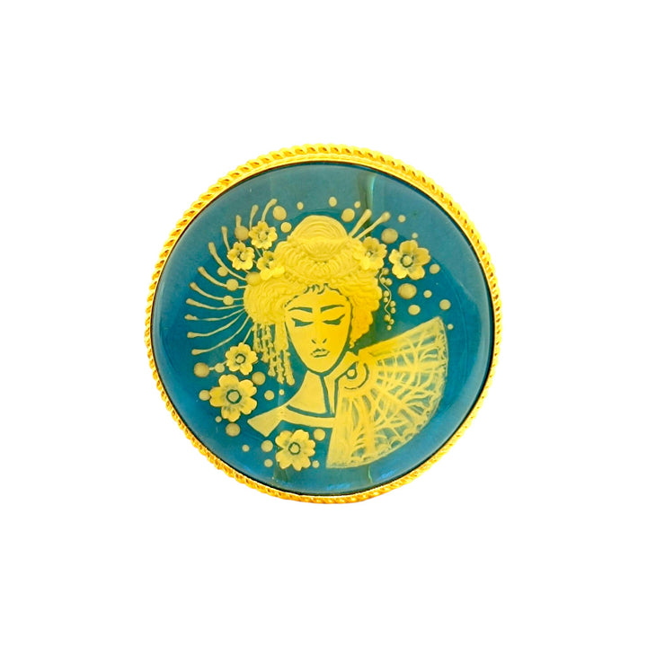 Anello Geisha di Ambra blu montato in Argento Dorato
