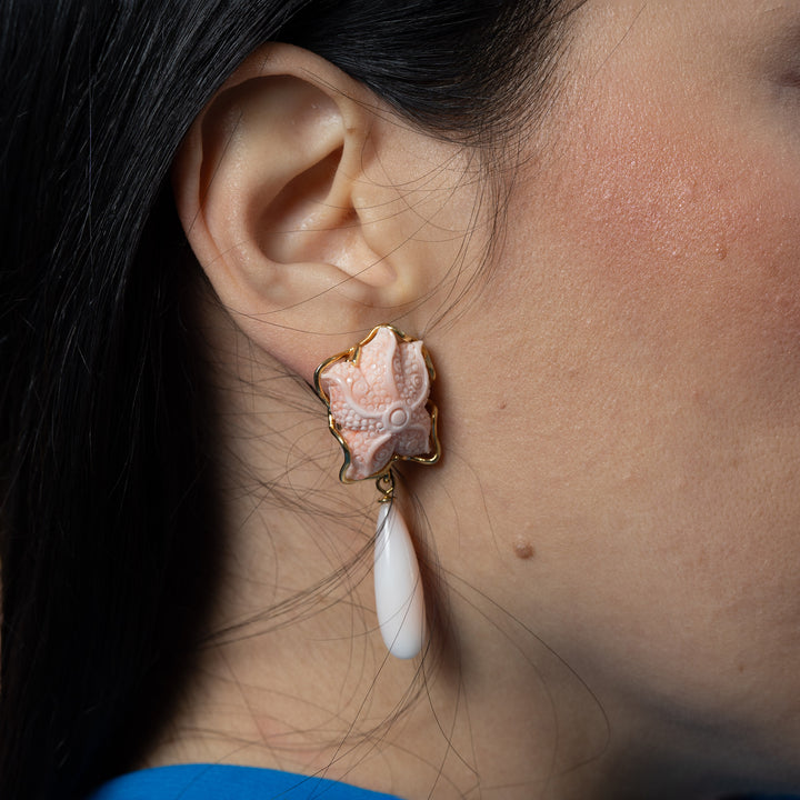 Pink coral starfish earrings mounted on silver