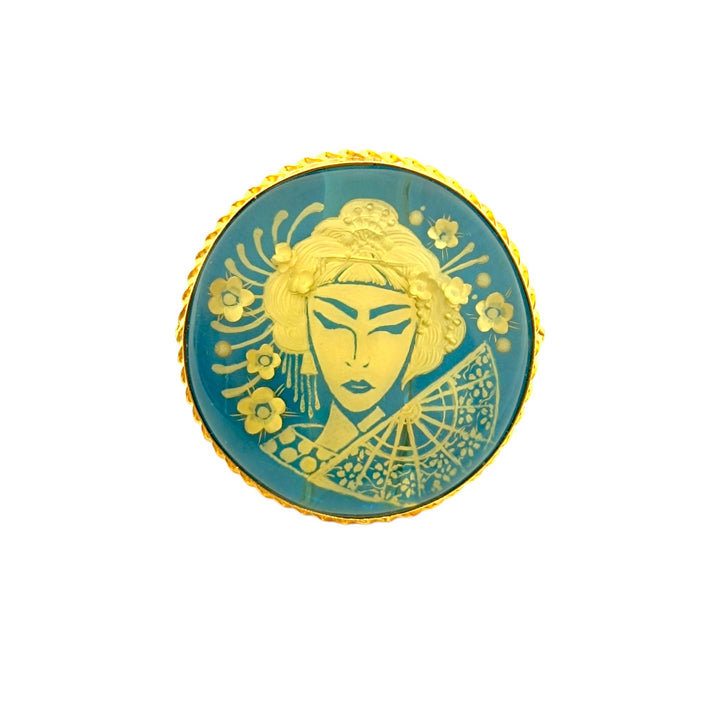 Anello Geisha di Ambra blu montato in Argento Dorato
