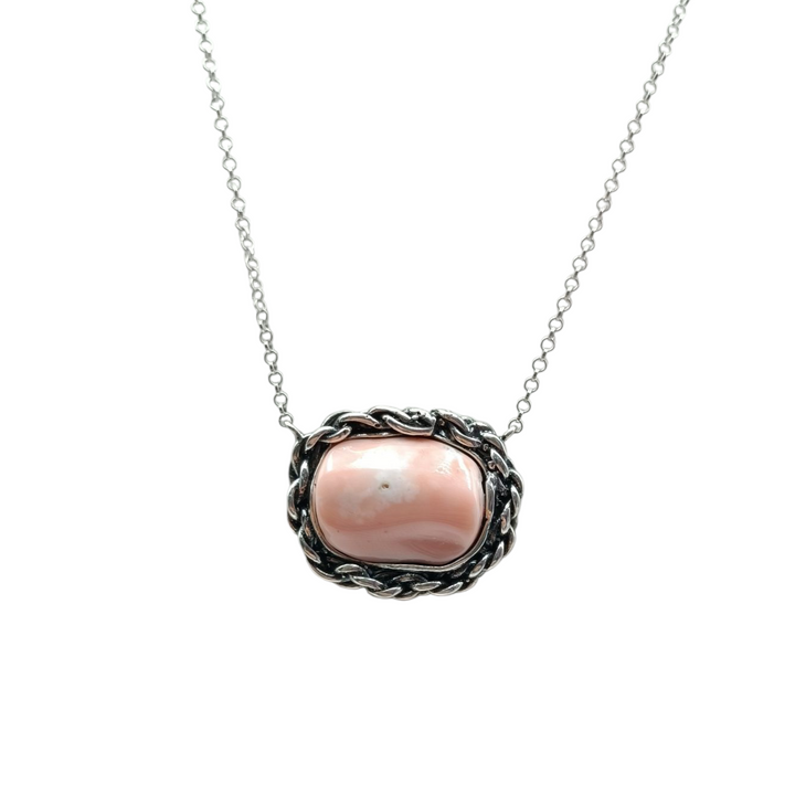 Necklace with red and pink coral pendant mounted on silver and gold-plated silver