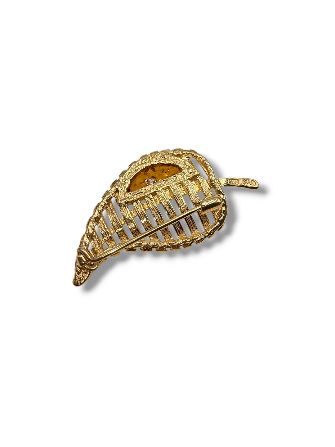 Amber leaf brooch mounted in silver