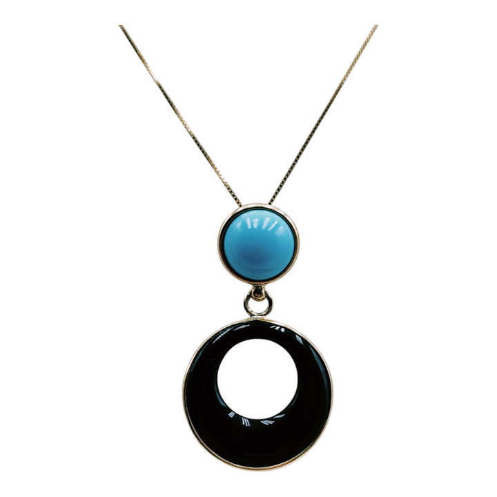 Pendant in turquoise paste and black agate mounted on silver