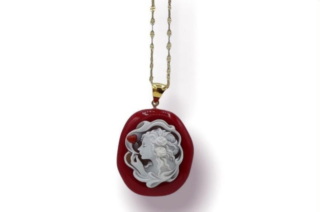 Heart blow pendant on cameo
